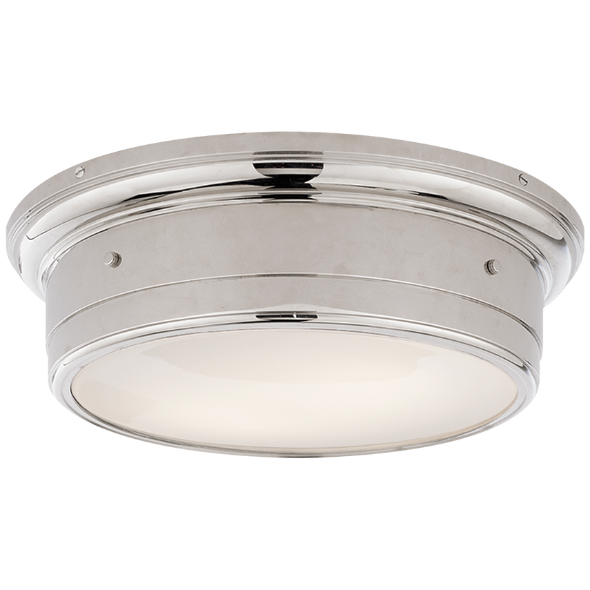 Low-profile flush mount with white glass diffuser and brass frame, casting a soft glow with sculptural elegance for ceilings under 9 feet.