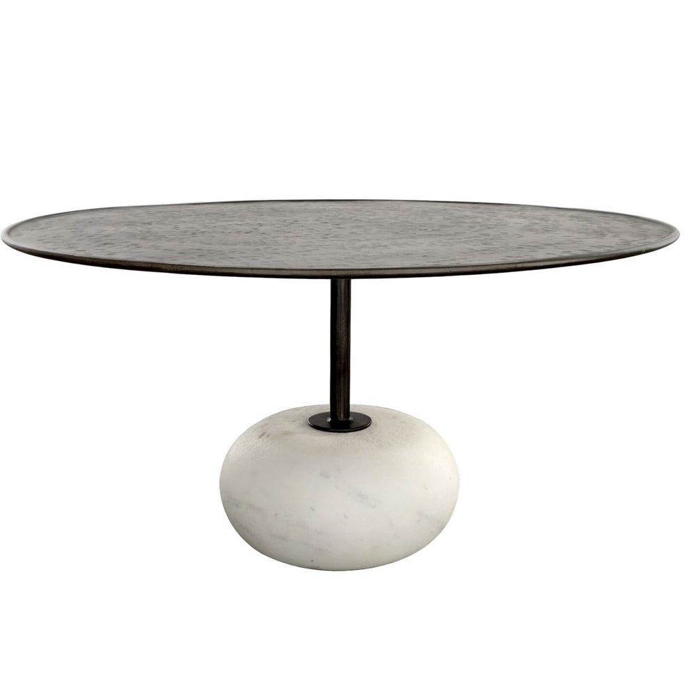 Round coffee table with hammered steel top and carved white stone base.