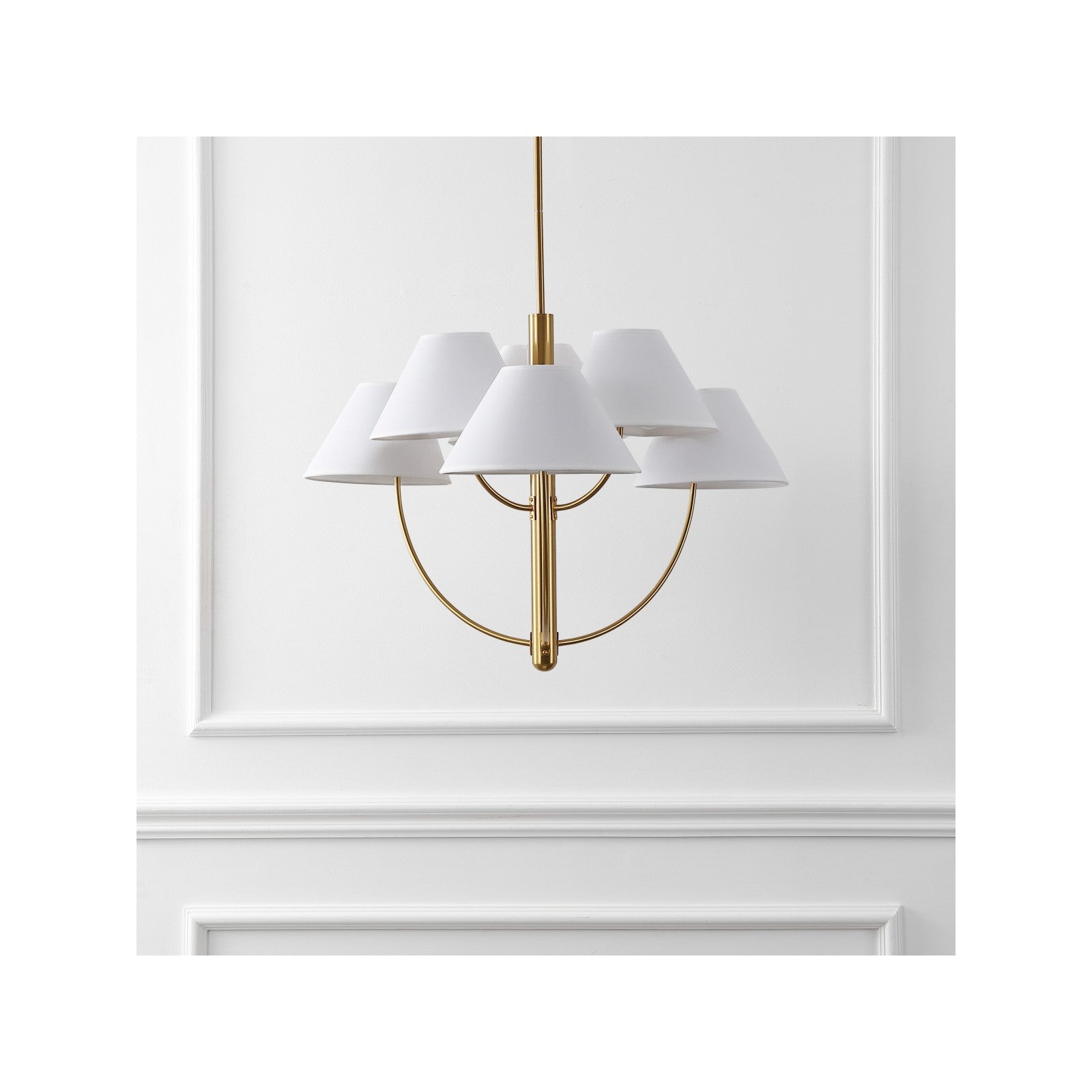 Bellcourt Brass Chandelier detail — cotton cone shade and warm brass arm, by Rachel Blindauer