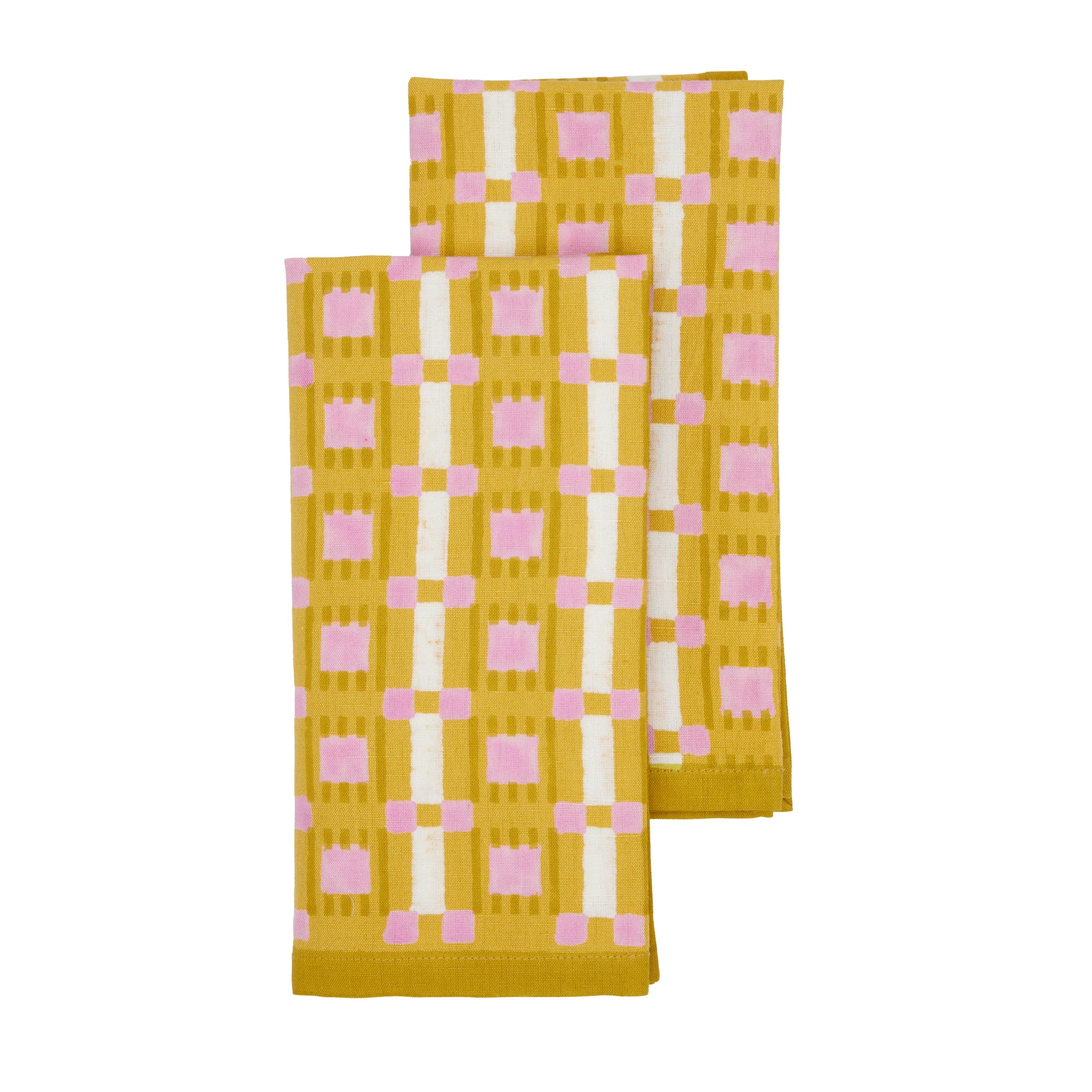 Hand block printed plaid napkin in terracotta, blush, and sand on linen-cotton blend