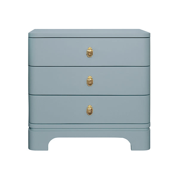 Light blue lacquered nightstand with soft curves and three drawers, featuring a whimsical brass beetle knob—perfect for modern bedrooms with personality.