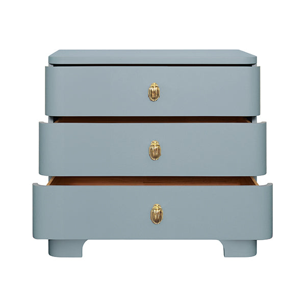 Light blue lacquered nightstand with soft curves and three drawers, featuring a whimsical brass beetle knob—perfect for modern bedrooms with personality.