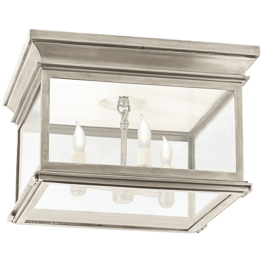 Square flush mount ceiling light with clear glass and antique brass finish for timeless modern interiors.