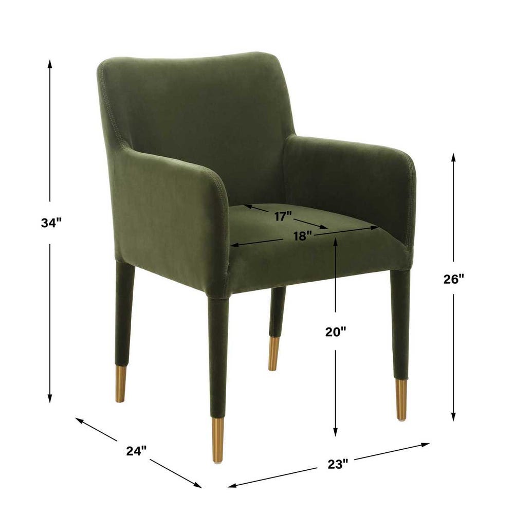 Green velvet armchair with dimensions marked on a white background
