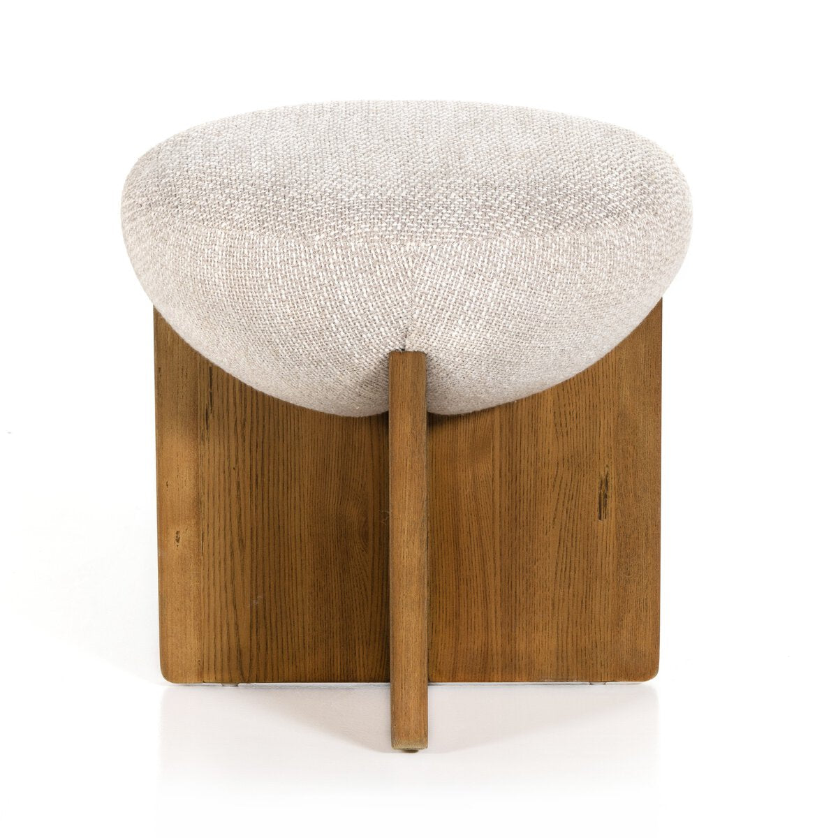 Stool with textured cushion and wooden base on a white background.