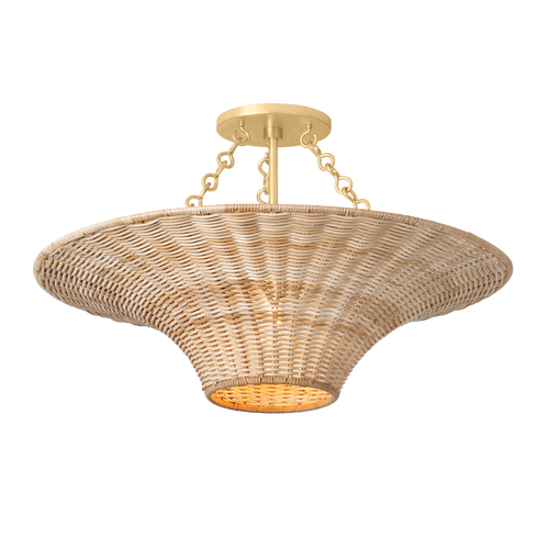 Handwoven wicker ceiling light with flared silhouette and gold canopy—coastal modern style with upward and downward ambient glow.