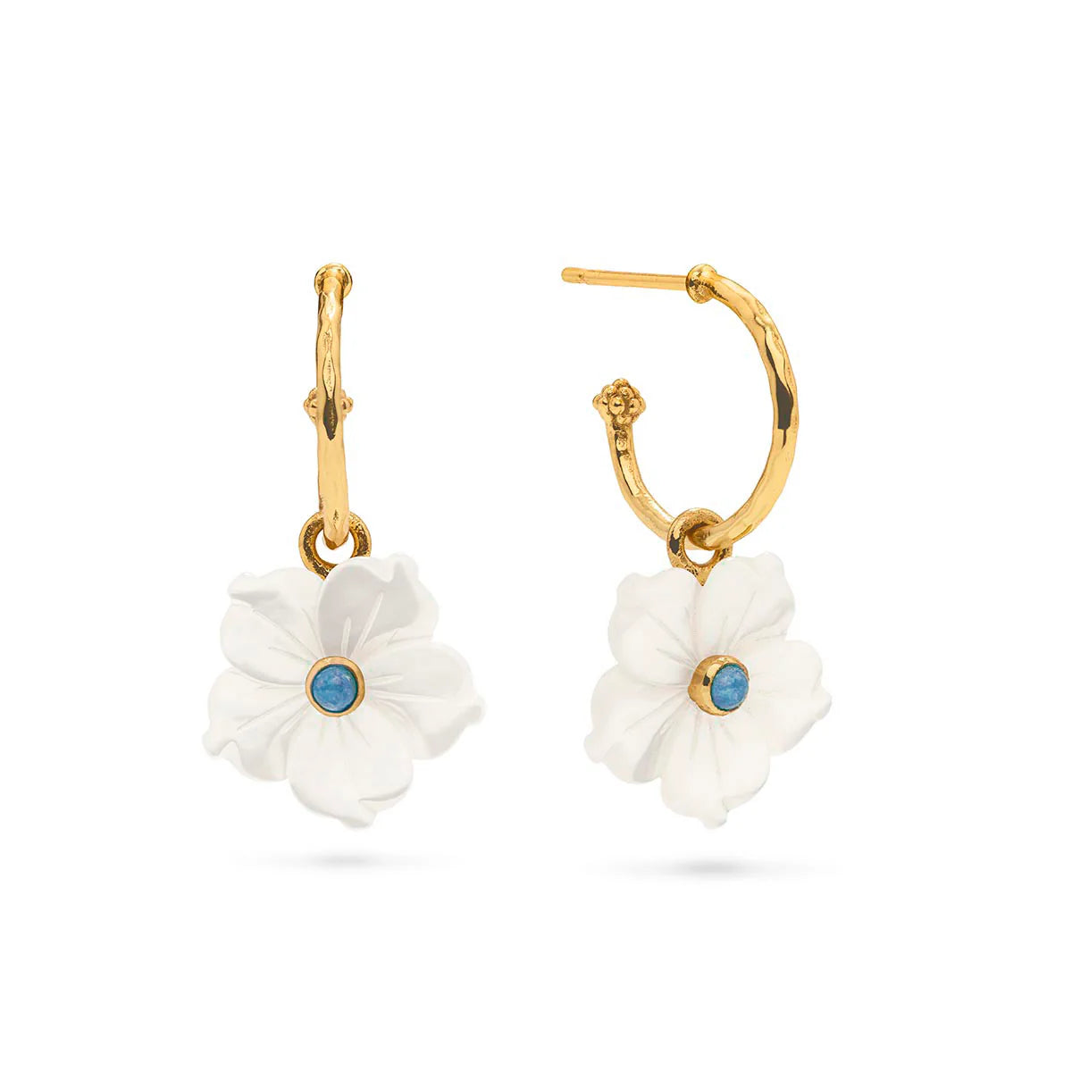 Hand-carved mother-of-pearl flower hoops in 18K gold-plated brass, glowing with movement, elegance, and seaside romance.