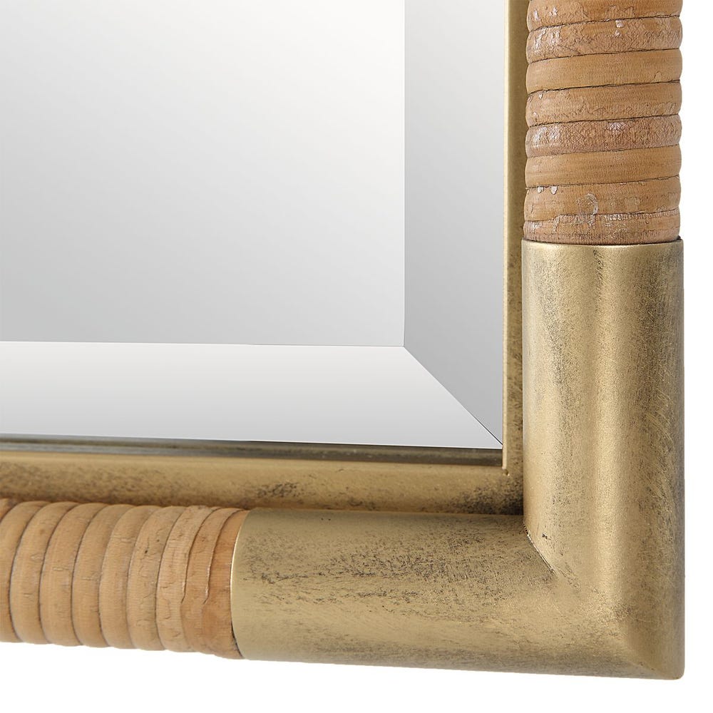 Close up of Rectangular rattan and gold framed vanity mirror with handwoven detail – Rachel Blindauer