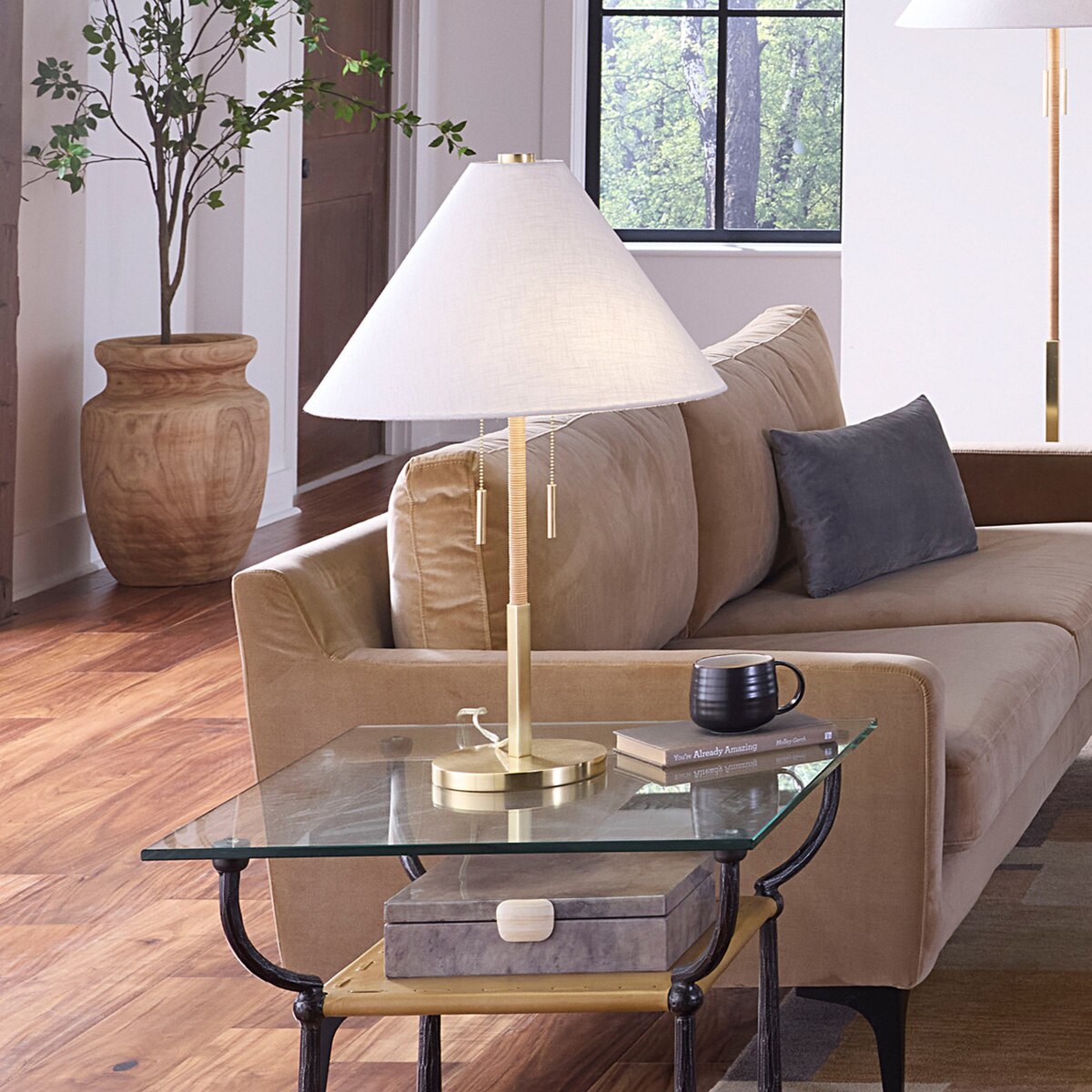 Palmetto Rattan Table Lamp styled on a nightstand, by Rachel Blindauer