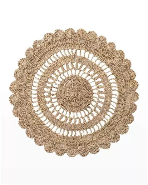 Natural handwoven abaca placemat with scalloped edge, adding organic texture and relaxed elegance to coastal or holiday tablescapes.