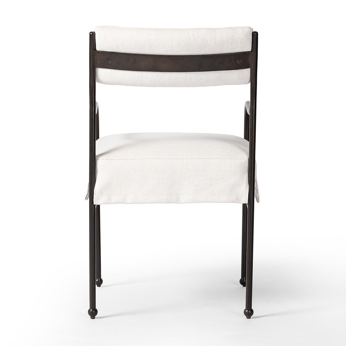 Sculptural outdoor dining chair with curved matte gunmetal frame and linen-toned all-weather weave, styled for refined alfresco dining.
