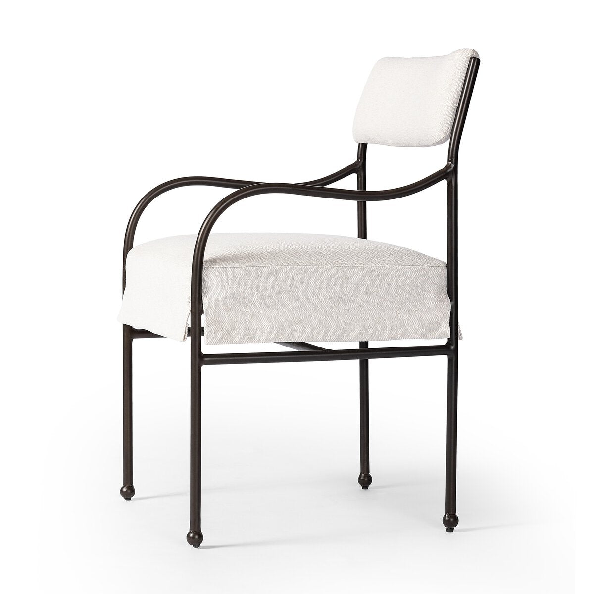Sculptural outdoor dining chair with curved matte gunmetal frame and linen-toned all-weather weave, styled for refined alfresco dining.