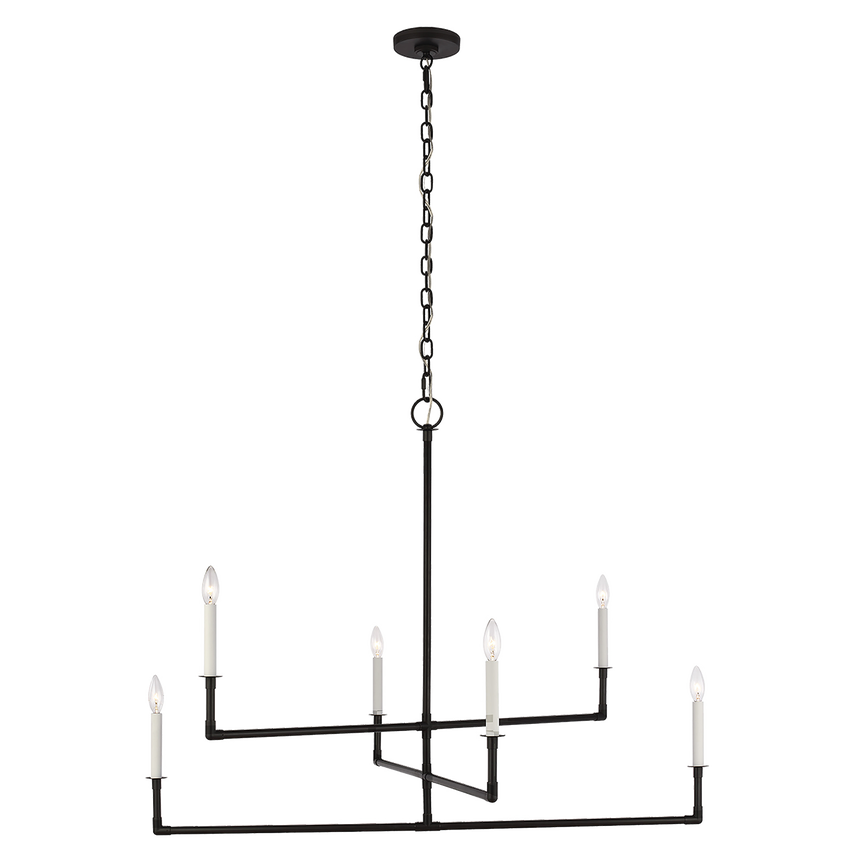 Aged iron chandelier with sculptural linear frame and white candle holders, great for large vaulted interiors.