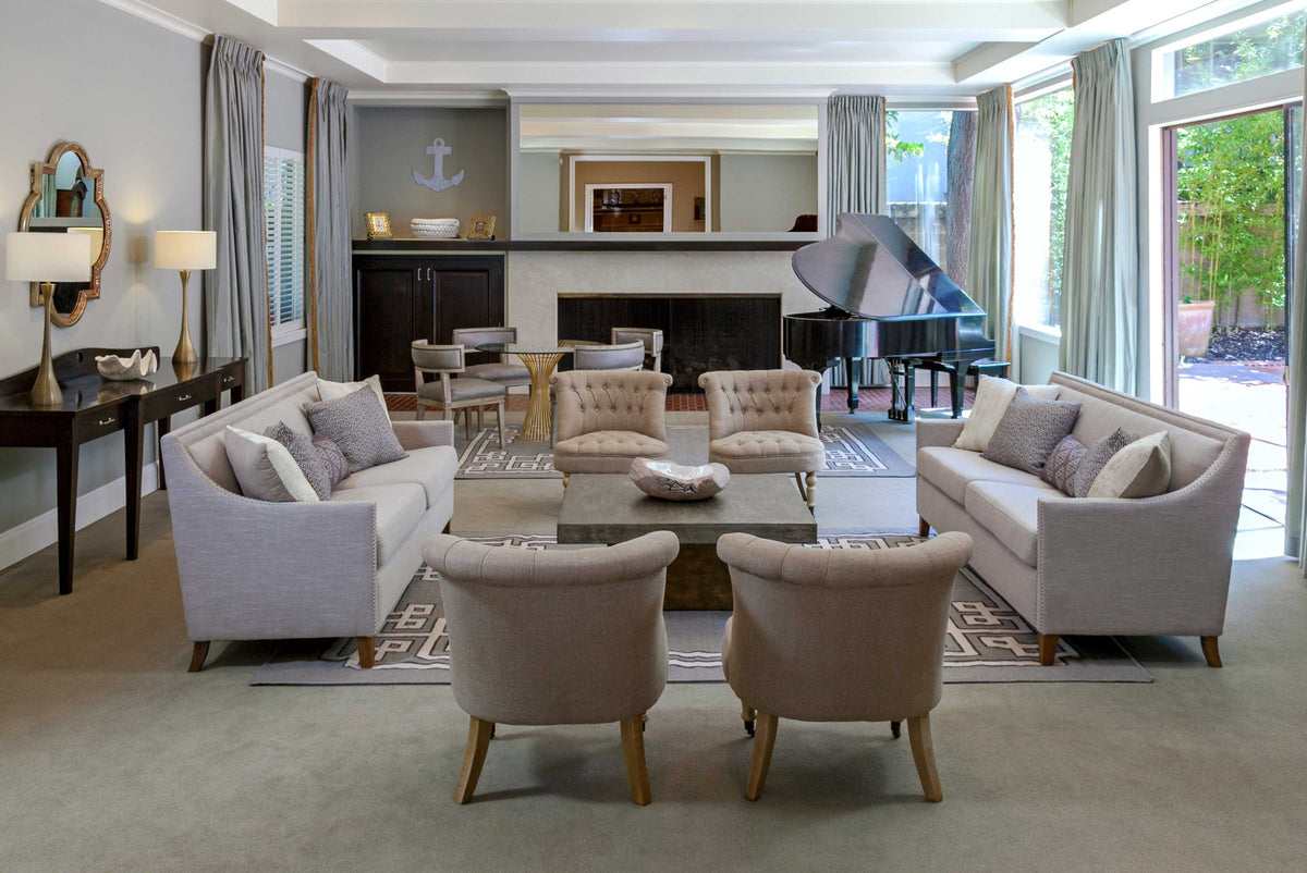 Valois Hammered Quatrefoil Mirror in a gray and silver living room designed by Rachel Blindauer