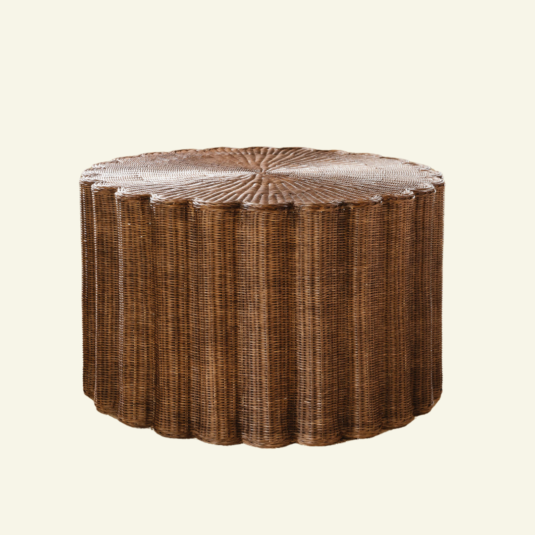 Corolla round rattan coffee table with a fluted scalloped drum in warm teak