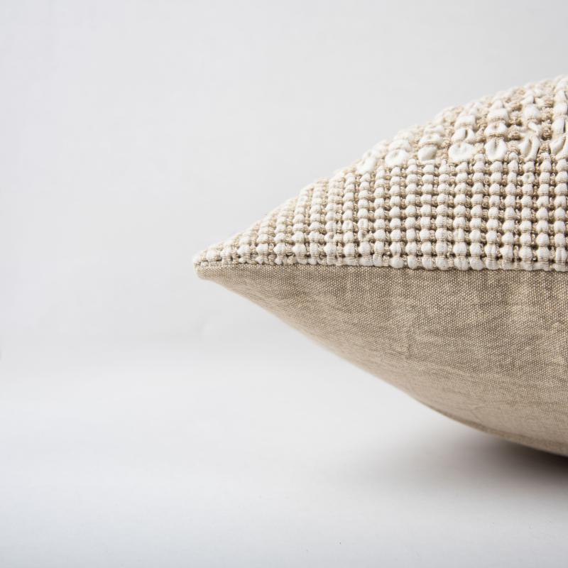 Ridge waffle weave pillow styled on a sofa