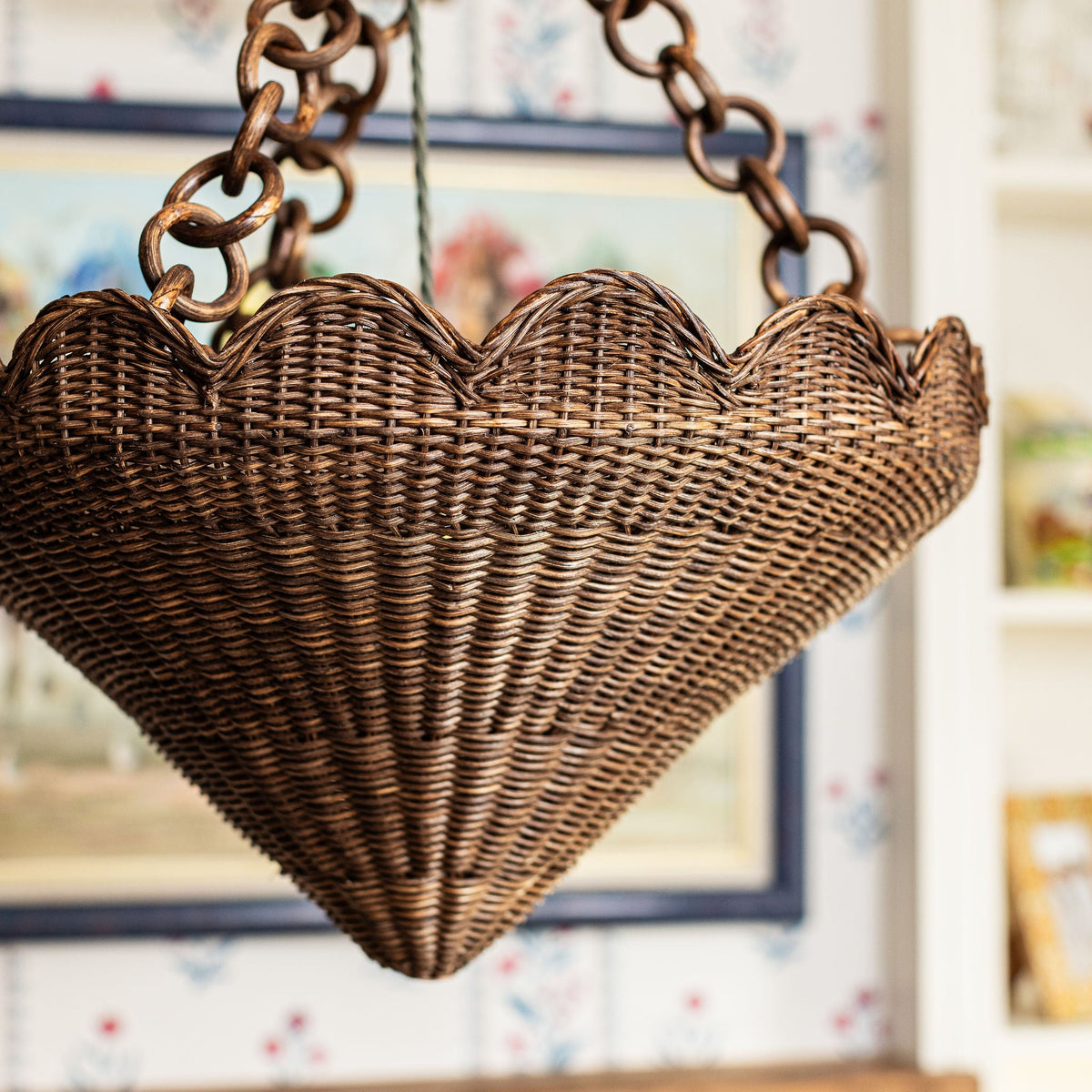 Close-up of the scalloped rim on the teak rattan pendant