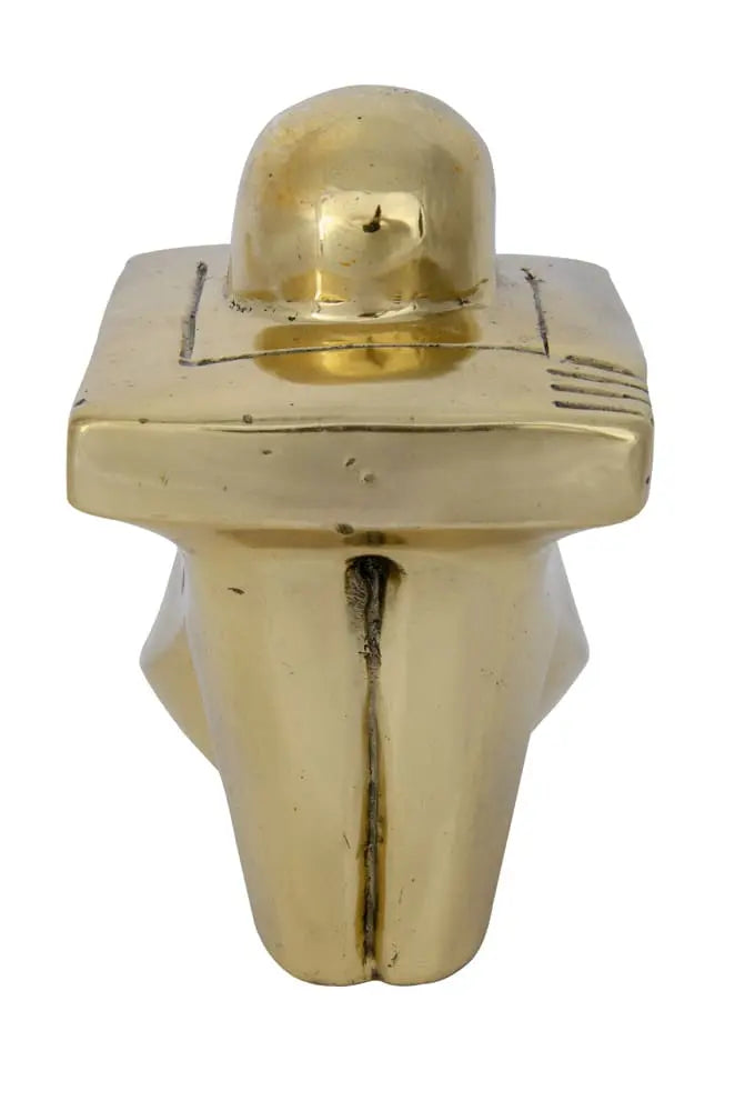 Handcrafted brass figurine in seated reflective pose, with antique finish and sculptural modern design.