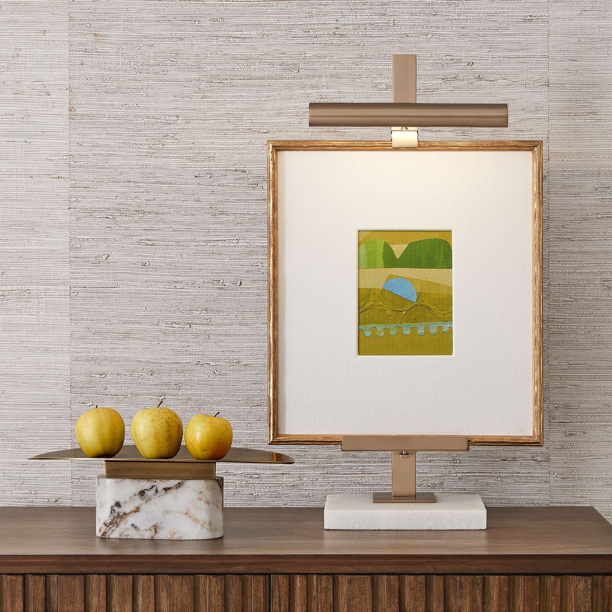 Eclipse Plinth Vessel styled on a wood console with abstract art and citrus, Rachel Blindauer decor collection