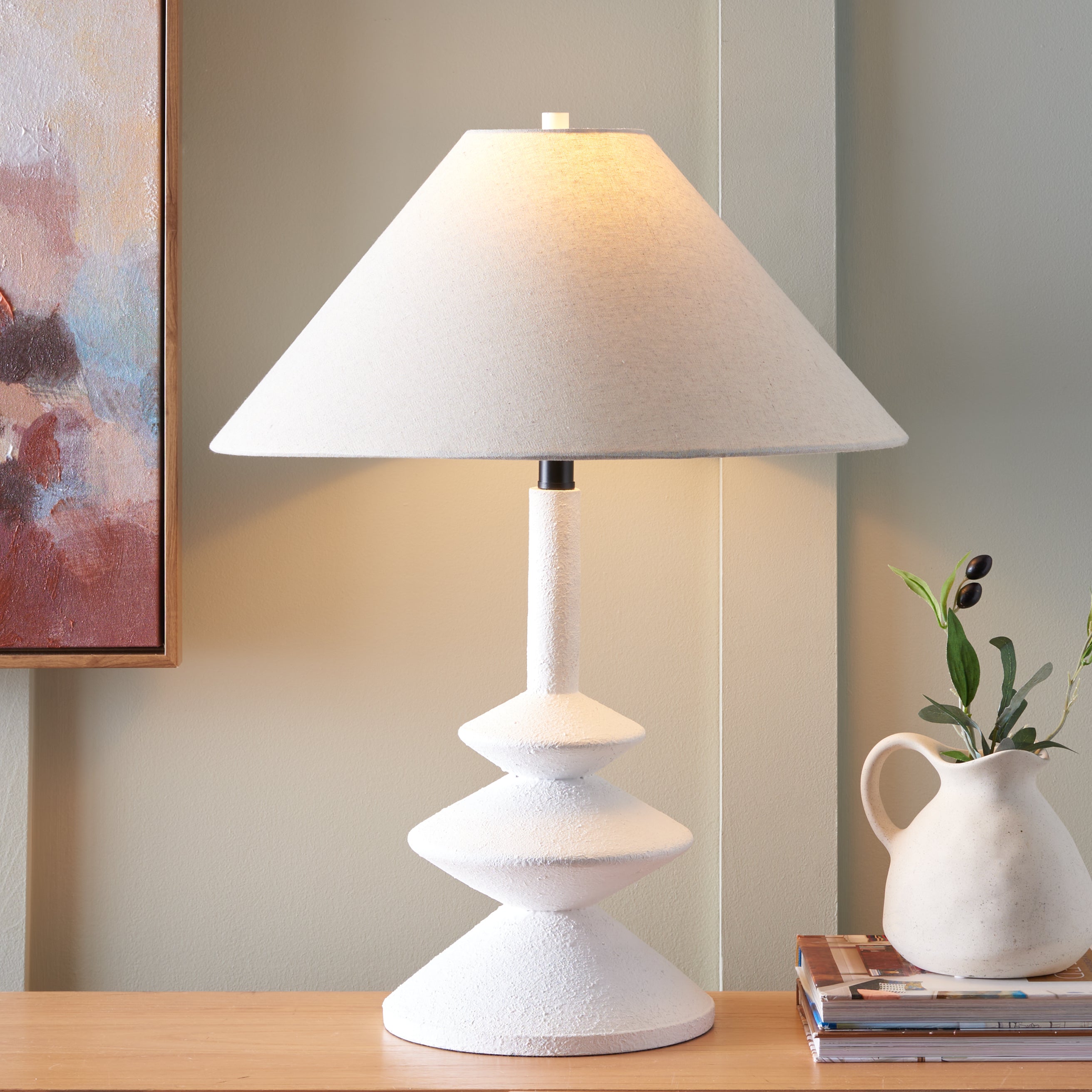 Alcove Table Lamp in a living room corner — neutral white lighting by Rachel Blindauer