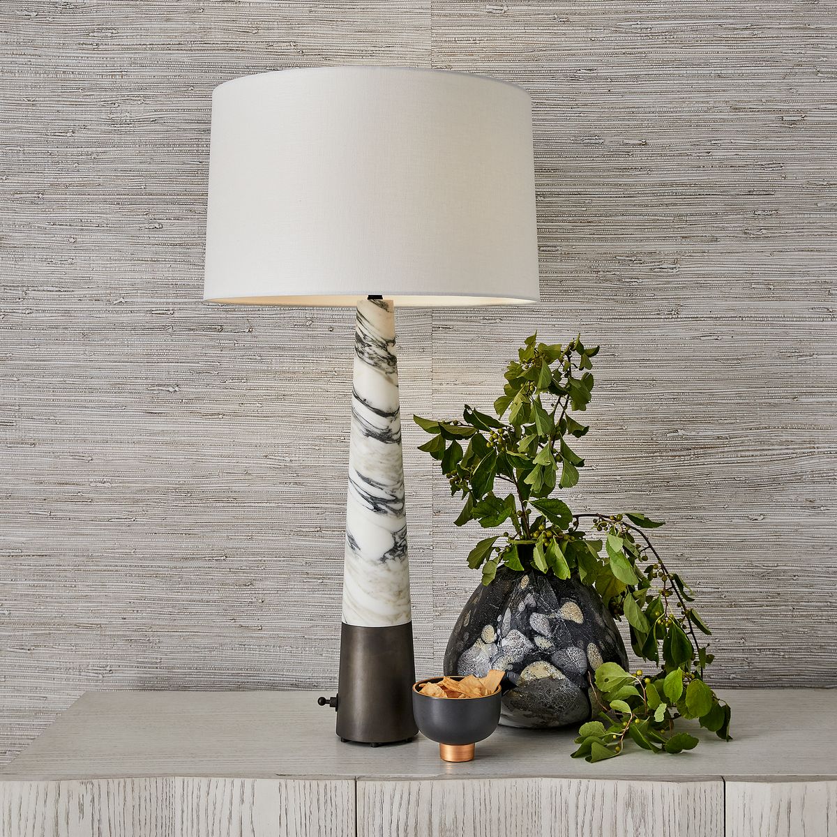 Atelier Table Lamp with tall Arabescato marble base, linen drum shade, and dark bronze dimmer base – refined sculptural lighting by Rachel Blindauer