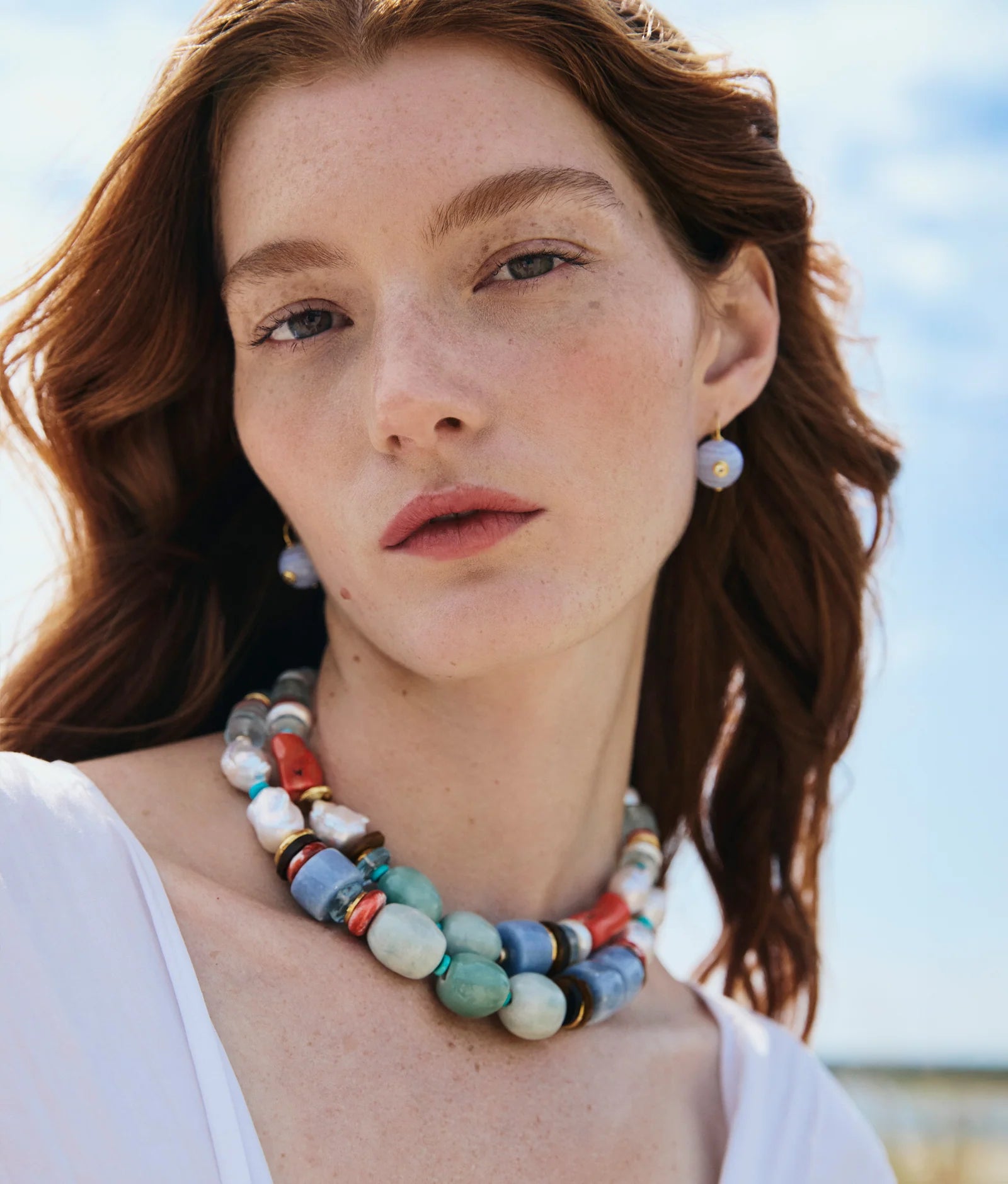 Gold-fill drop earrings with semiprecious blue agate and inlaid lemon quartz gemstones