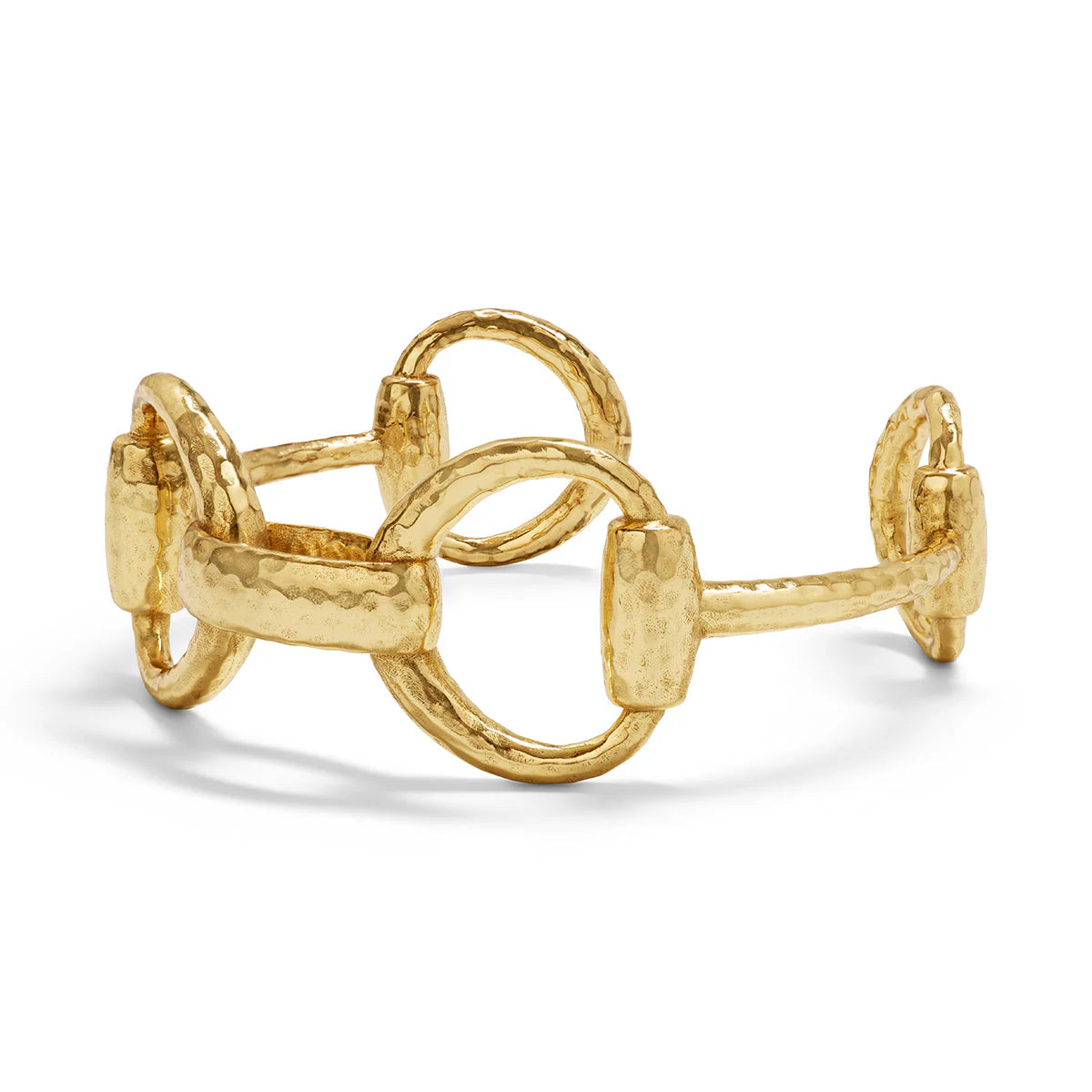 Gold equestrian snaffle bit cuff bracelet with oversized sculptural links, handmade in India, styled for effortless elegance.