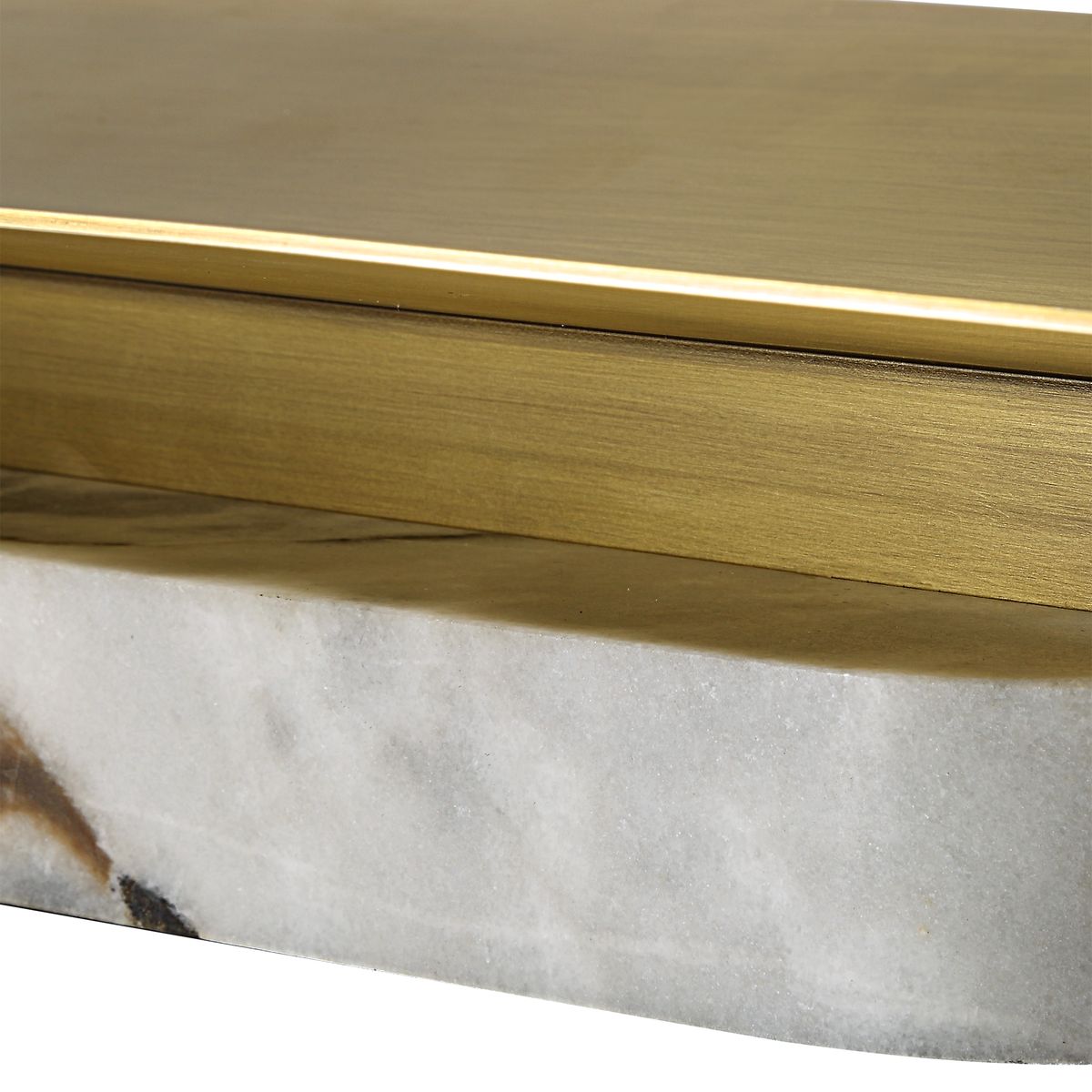 Linea Arc Vessel with matte brass top and honed marble base, styled as a sculptural centerpiece on a modern console.