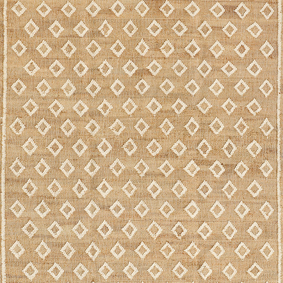 Marigold Handwoven Blockprint Flatweave Rug — overhead close-up of allover diamond blockprint pattern in natural jute and cream tones, one of Rachel Blindauer's favorites