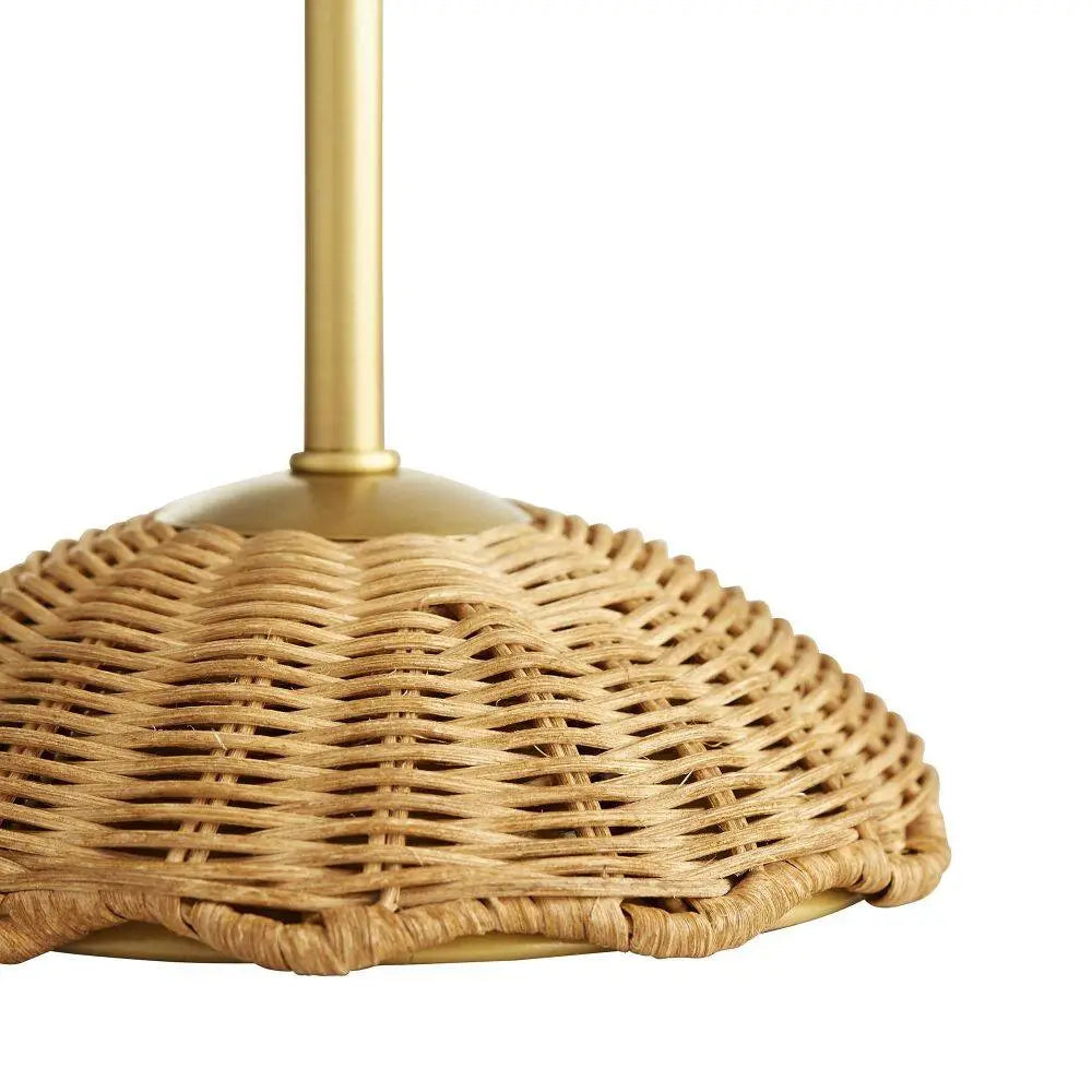 Natural rattan lamp with scalloped shade and antique brass stem—handcrafted island elegance with a full-range dimmer for soft glow.