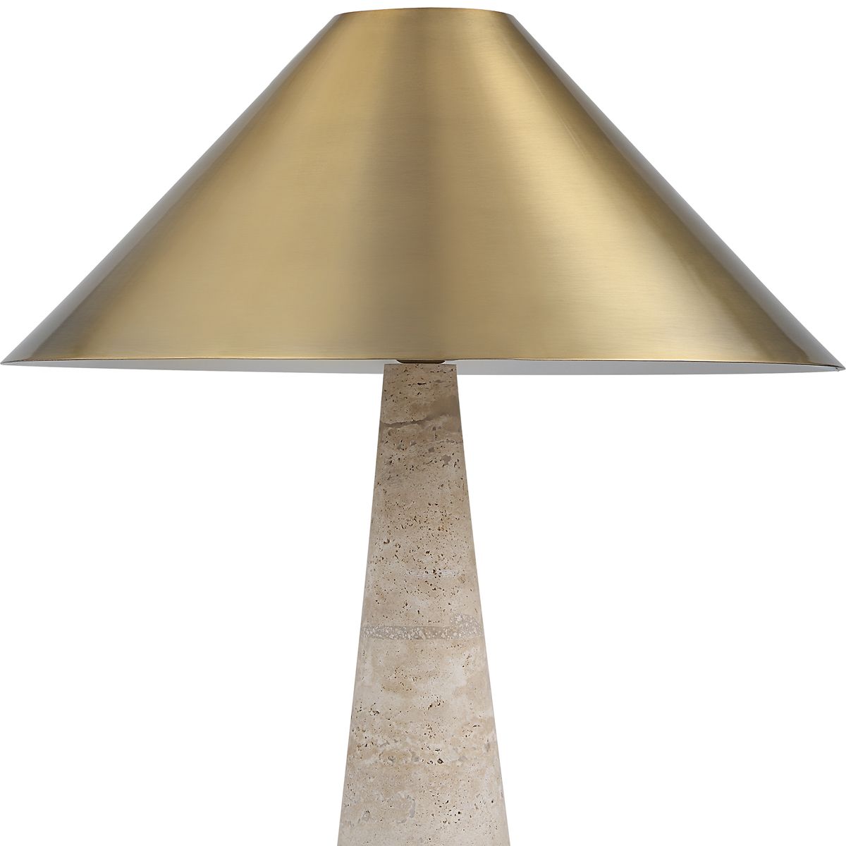Monolith Table Lamp with honed beige travertine base and antique brass tapered shade, combining sculptural form with ambient lighting