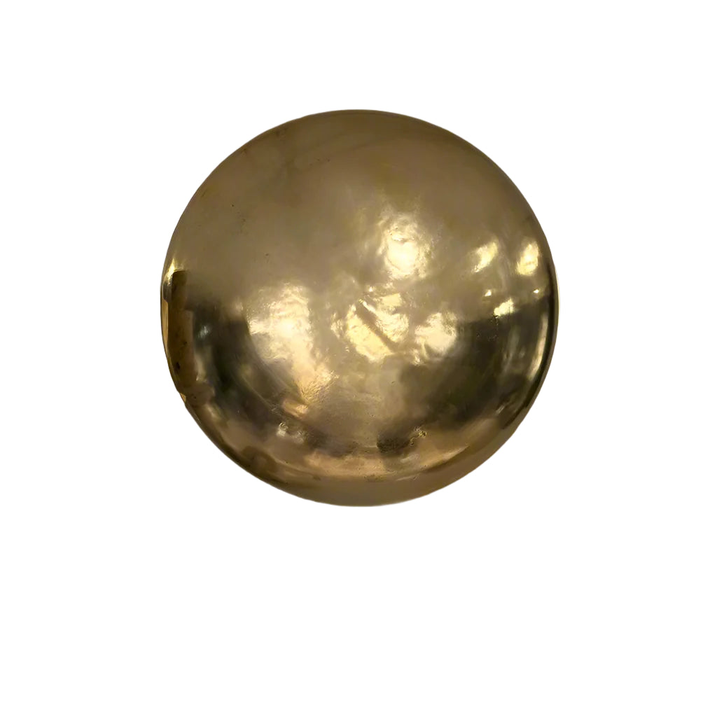 Reflective gold convex wall disc in sculptural cast aluminum, 32-inch diameter.