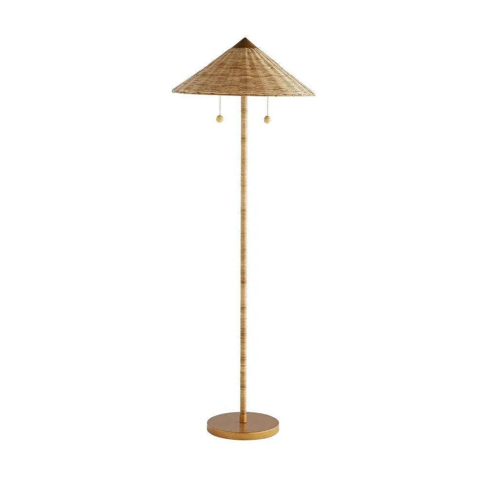 Tall rattan floor lamp with conical shade and antique brass base—coastal-inspired lighting with dual pull chains and warm, ambient glow.