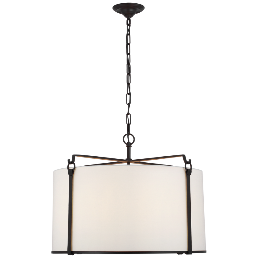 Forged iron pendant light with tapered linen shade and blackened rust finish, inspired by natural branch forms—ideal for entryways or round dining tables.