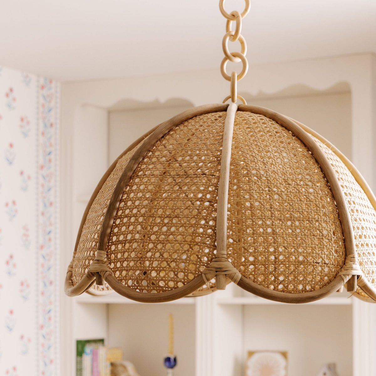 Close-up of the cane dome pendant and its rattan chain
