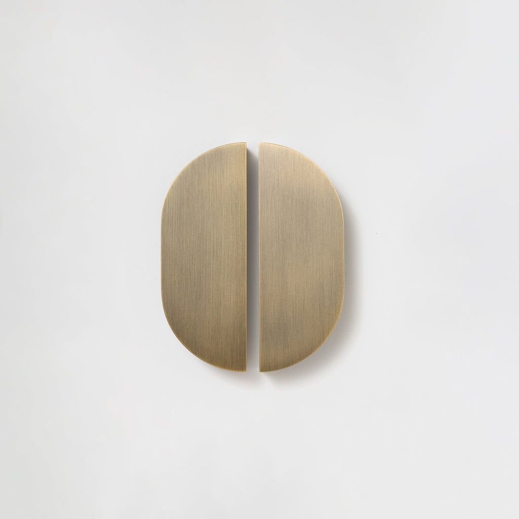 Bow Brass Cabinet Pull in Aged Brass