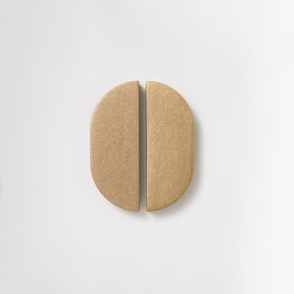Bow Brass Cabinet Pull in Tumbled Brass