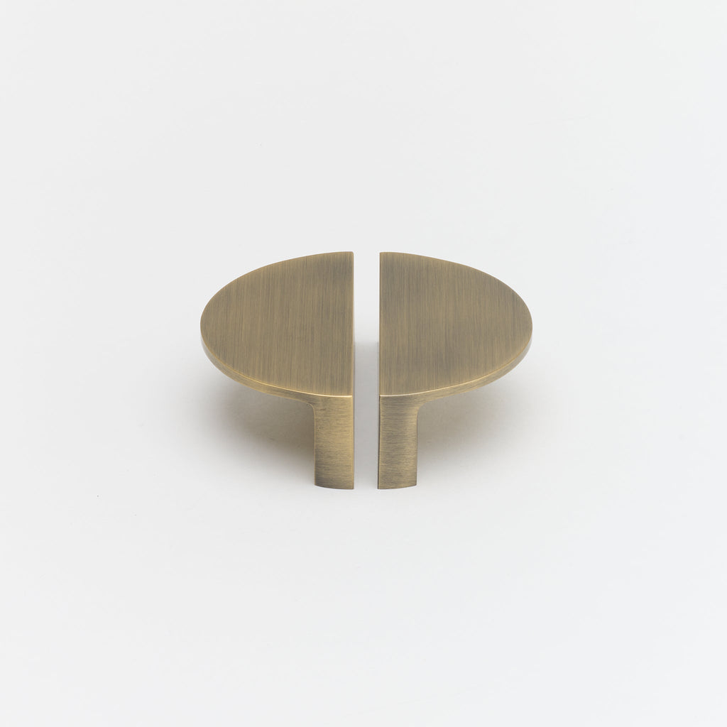 Crescent Brass Cabinet Pull in Aged Brass