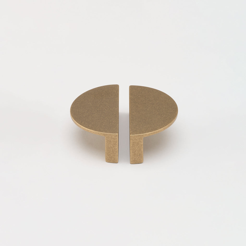 Crescent Brass Cabinet Pull in Tumbled Brass