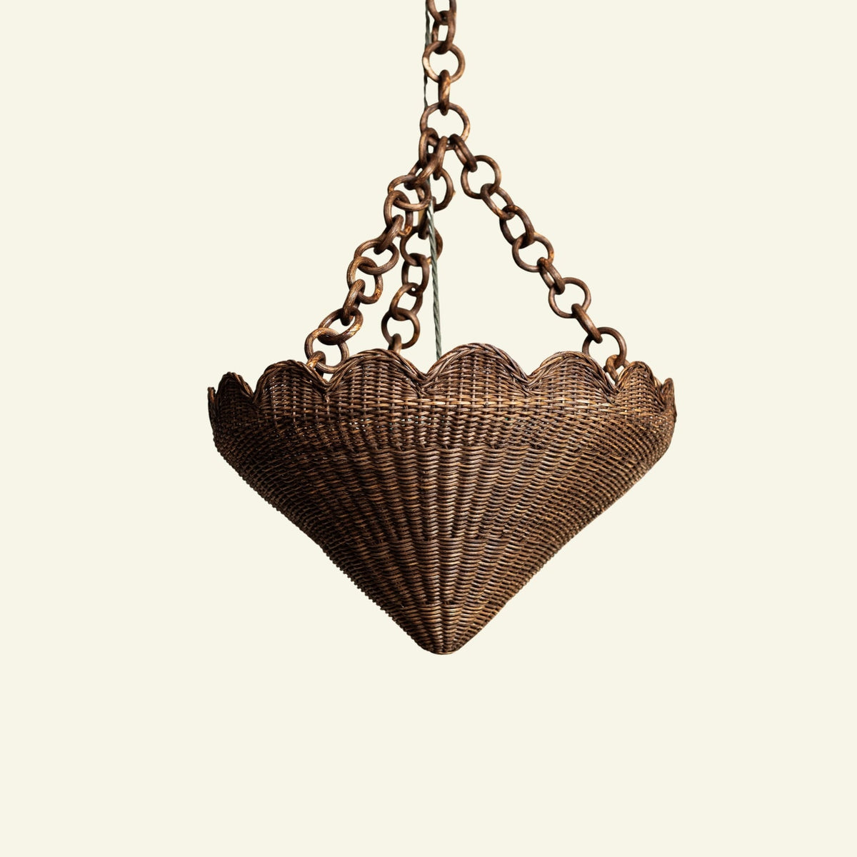 Fleur scalloped rattan pendant in warm teak with a rattan chain