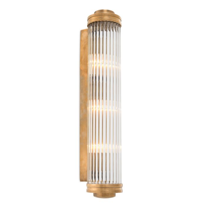 Fluted glass wall sconce in vintage brass, XL size, lit