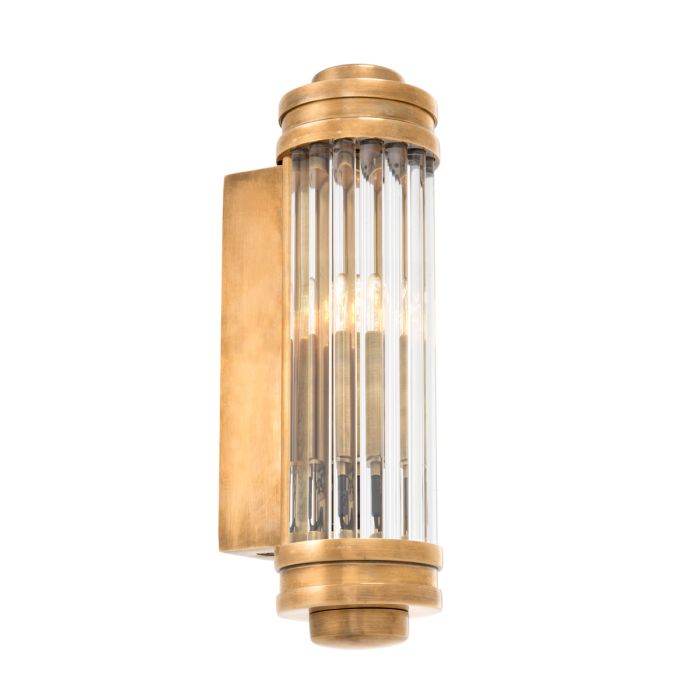 Fluted glass wall sconce in vintage brass, XS size, lit