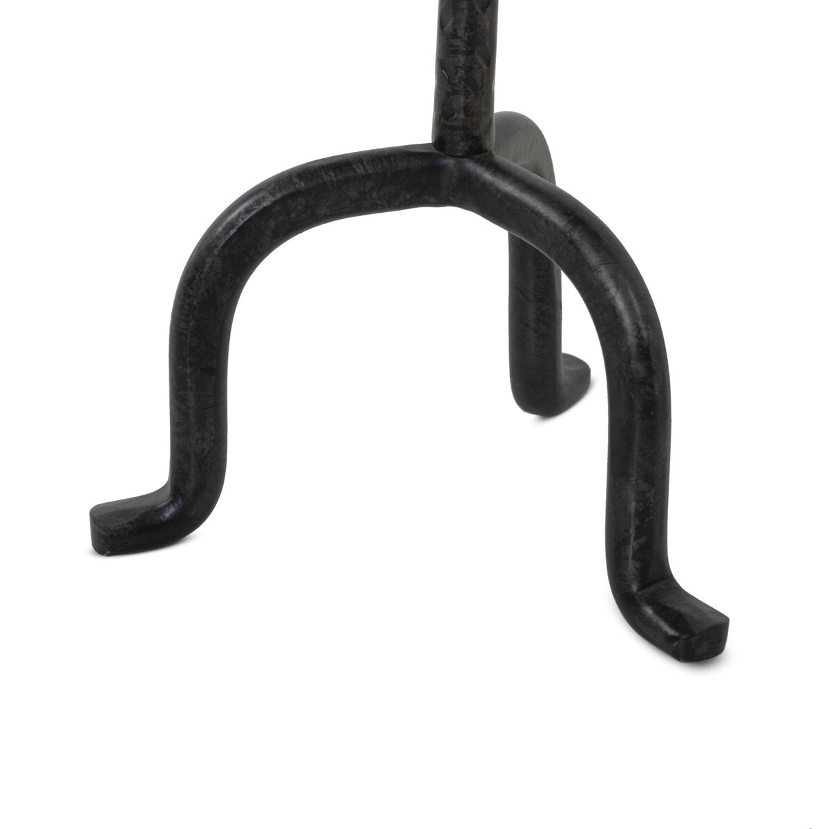 Black metal iron foot of a drink table on a white background