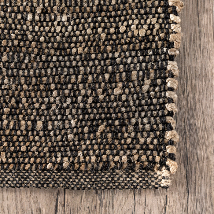 Hawthorne Rug in Charcoal — woven edge detail