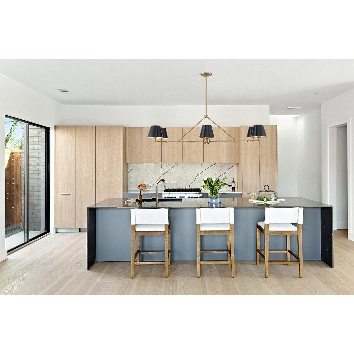 Hollis 6-Light Gold Chandelier - Black shade dining scene